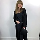 На четвертой фотографии кардиган черного цвета с подкрученными рукавами и низом от Shapar, бренда женской одежды ручной работы в интернет-магазине связанных спицами вещей.