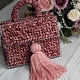 На четвертой фотографии женская красивая коралловая сумка с кистью от Shapar, бренда вязаной одежды и аксессуаров ручной работы в интернет-магазине связанных спицами вещей.