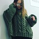 На второй фотографии женский объемный свитер крупной вязки оливкового цвета с косами от Shapar, бренда вязаной одежды ручной работы в интернет-магазине связанных спицами вещей.
