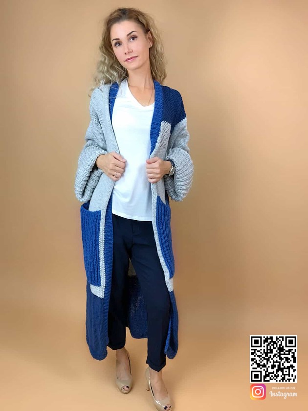 На фотографии женский кардиган с карманами спицами от Shapar, бренда вязаной одежды ручной работы в интернет-магазине связанных вещей.