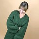 На пятой фотографии женский зеленый кардиган крупной вязки от Shapar, бренда вязаной одежды ручной работы в интернет-магазине связанных вещей.