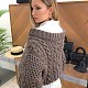 На второй фотографии женский коричневый джемпер со спины от Shapar, бренда вязаной одежды ручной работы в интернет-магазине связанных спицами вещей.