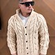 На третьей фотографии модный мужской кардиган бежевого цвета от Shapar, бренда вязаной одежды ручной работы в интернет-магазине связанных спицами вещей.