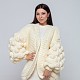 На четвертой фотографии женский кардиган молодежный молочного цвета от Shapar, бренда вязаной одежды ручной работы в интернет-магазине связанных спицами вещей.