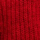 На пятой фотографии свитер красного цвета крупным планом от Shapar, бренда вязаной одежды ручной работы в интернет-магазине связанных спицами вещей.