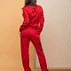 На третьей фотографии красный брючный костюм женский со спины от Shapar, бренда вязаной одежды ручной работы в интернет-магазине связанных спицами вещей.