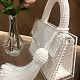 На второй фотографии женская модная вязаная сумка белого цвета от Shapar, бренда аксессуаров ручной работы в интернет-магазине связанной спицами одежды.