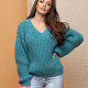 На третьей фотографии пушистый бирюзовый пуловер от Shapar, бренда вязаной одежды ручной работы в интернет-магазине связанных спицами вещей.