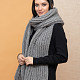 На третьей фотографии большой серый шарф крупной вязки от Shapar, бренда вязаной одежды ручной работы в интернет-магазине связанных спицами вещей.