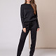 На пятой фотографии черный спортивный костюм женский с завязками на брюках от Shapar, бренда вязаной одежды ручной работы в интернет-магазине связанных спицами вещей.