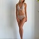 На шестой фотографии вязаный купальник женский раздельный бежевого цвета от Shapar, бренда пляжной одежды ручной работы в интернет-магазине связанных спицами вещей.