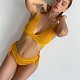 На пятой фотографии вязаный раздельный купальник желтого цвета от Shapar, бренда женской пляжной одежды ручной работы в интернет-магазине связанных крючком вещей.
