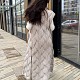 На третьей фотографии длинный жилет женский со спины от Shapar, бренда вязаной одежды ручной работы в интернет-магазине связанных спицами вещей.