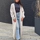 На третьей фотографии женский кардиган на запах в цвете слоновая кость от Shapar бренда вязаной одежды ручной работы в интернет-магазине связанных спицами вещей.